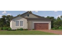Charming single-story home with a two-car garage and well-maintained landscaping at 11853 Sparkling Topaz Cv, Parrish, FL 34219