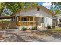 Charming single-Gathering home with a cozy front porch and well-maintained landscaping at 315 W Alfred St, Tampa, FL 33603