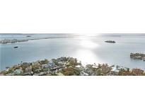 Expansive waterfront community with homes nestled along canals and breathtaking views of the bay at 455 Alt 19 S Hwy # 81, Palm Harbor, FL 34683