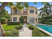 Inviting home with a terracotta roof, manicured landscaping, and a private pool in a desirable location at 608 Orange Ave, Clearwater, FL 33756