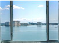 Wonderful water view from the window showcasing waterfront condos and the distant skyline at 6372 Palma Del Mar S Blvd # 1007, St Petersburg, FL 33715