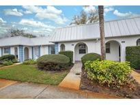 Charming home showcasing a well-manicured lawn and freshly painted exterior in a desirable community at 4235 Richmere Dr # 4235, New Port Richey, FL 34652