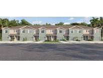 Charming townhome featuring a cozy two-story design and attached garage with easy access to the community at 4450 Rachel Falls Dr, Tampa, FL 33610