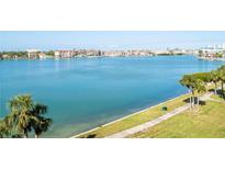 Expansive water view showcasing the waterfront property and beautiful blue water on a bright day at 8020 Sailboat Key S Blvd # 404, St Pete Beach, FL 33707