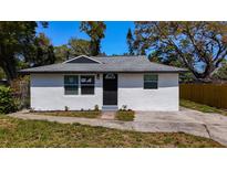 Charming single-story home featuring a new roof, fresh paint, and landscaping in a peaceful neighborhood at 3755 10Th S Ave, St Petersburg, FL 33711