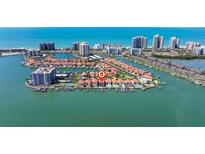 Beautiful waterfront community with boat docks and access to the Gulf of Mexico and beachfront condo views at 218 Sand Key Estates Dr, Clearwater Beach, FL 33767