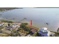 Gorgeous waterfront property featuring a private dock and stunning bay views, perfect for serene coastal living at 116 Shore Drive Pl, Oldsmar, FL 34677