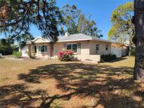 Charming single-story home with mature trees and landscaping at 2850 41St N St, St Petersburg, FL 33713