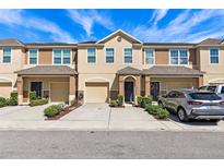 Charming multi-Gathering unit featuring neutral color scheme, attached garages, and well-maintained landscaping at 4081 71St N Ter, Pinellas Park, FL 33781