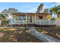 Charming single-story home with a cozy front porch and well-maintained landscaping at 4621 4Th N Ave, St Petersburg, FL 33713