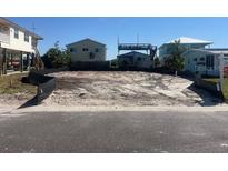 Vacant lot ready for building with utilities available and desirable neighborhood close to beach at 842 180Th E Ave, Redington Shores, FL 33708