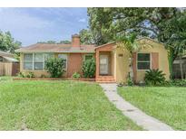 Charming single-story home with a well-manicured lawn and inviting front entrance at 1807 23Rd N Ave, St Petersburg, FL 33713
