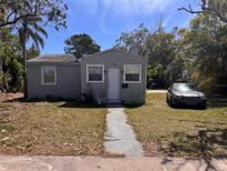 Cozy one-story home featuring a brick facade, quaint front yard, and driveway at 4244 12Th S Ave, St Petersburg, FL 33711