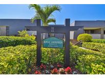 Welcoming Royal Aberdeen Lodge 22 sign surrounded by lush landscaping and a mature palm tree on a bright, sunny day at 36750 Us 19 N # 22207, Palm Harbor, FL 34684