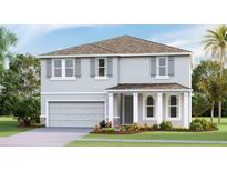 Charming two-story home with a well-manicured lawn, attached garage, and inviting front porch at 19672 Gladeview Way, Land O Lakes, FL 34638