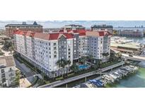 Stunning waterfront condo featuring a beautiful red roof, a refreshing pool, and convenient boat docks at 700 S Harbour Island Blvd # 240, Tampa, FL 33602