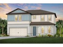 Charming two-story home boasts a two-car garage, inviting front porch, and beautifully landscaped yard at 9832 Crescent Moon Dr, Riverview, FL 33578