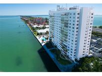 Beautiful waterfront condo featuring a pool, well-maintained landscaping, and breathtaking views at 7200 Sunshine Skyway S Ln # 16G, St Petersburg, FL 33711