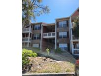 Charming condo complex with brick facade and multiple stories at 10200 Gandy N Blvd # 235, St Petersburg, FL 33702