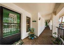 Inviting front entrance featuring a decorated door and charming seaside-themed accents and decor at 2537 Royal Pines Cir # 19I, Clearwater, FL 33763