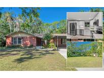 Charming brick home featuring a lush lawn, mature trees, and a covered carport, creating a welcoming curb appeal at 8136 Honeybee Ln, Tampa, FL 33635