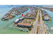Beautiful waterfront condo community with boat docks, tennis courts, and easy highway access at 301 Madeira Cir, Tierra Verde, FL 33715