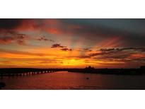 Breathtaking sunset view over the water with vibrant colors and skyline at 6265 Sun Blvd # 806, St Petersburg, FL 33715
