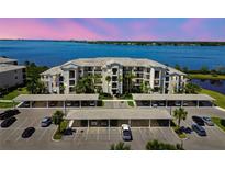 Beautiful condo building with covered parking and waterfront views at 1030 Tidewater Shores Loop # 104, Bradenton, FL 34208