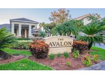 Beautiful entrance to The Avalon with a water fountain and lush landscaping at 1226 S Missouri Ave # 1013, Clearwater, FL 33756