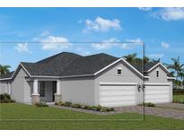 Charming single-story home with a manicured lawn and a two-car garage, perfect for comfortable living at 2801 Marrakesh Ln, Sarasota, FL 34234
