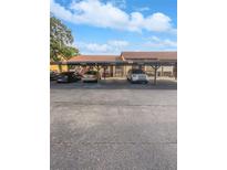 Exterior image of covered parking area for units at the property at 7741 Forest Trl # 7, Port Richey, FL 34668