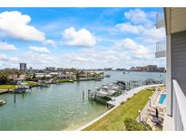 Expansive water views from this condo, complete with boat docks and gorgeous blue skies at 610 Island Way # 302, Clearwater Beach, FL 33767