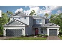 Charming two-story home with attached two-car garage and well-maintained landscaping at 1725 Trailhead Ln, Zephyrhills, FL 33541
