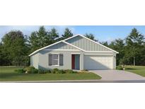 Charming single-story home featuring a two-car garage, well-maintained lawn, and pleasing exterior color scheme at 5618 Red Kite Dr, Wimauma, FL 33598