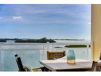 Balcony overlooking the waterfront features seating and a beautiful view at 755 Collany Rd # 504, Tierra Verde, FL 33715
