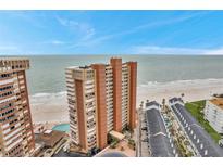 A stunning beachfront high-rise condo offers breathtaking ocean views and coastal living at its finest at 17940 Gulf Blvd # 2D, Redington Shores, FL 33708