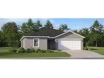 Charming single-story home with a well-maintained lawn and a two-car garage at 5622 Red Kite Dr, Wimauma, FL 33598