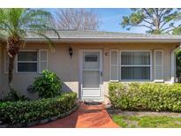 Charming condo featuring well-maintained landscaping and a welcoming front entrance at 2182 Corinne S Ct # C, St Petersburg, FL 33712