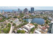 An aerial view of a condominium complex in St. Petersburg, Florida, overlooking Mirror Lake and downtown at 701 Mirror Lake N Dr # 119, St Petersburg, FL 33701