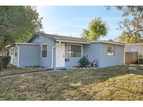 Charming single-story home with a well-manicured lawn and welcoming front entrance at 1300 37Th S St, St Petersburg, FL 33711