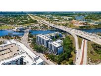 Stunning aerial view of a waterfront complex with easy access to the beach, highways, and downtown at 201 W Laurel St # 702, Tampa, FL 33602