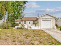 Charming single-story home featuring a well-maintained lawn and a single-car garage at 3821 6Th N Ave, St Petersburg, FL 33713