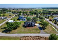 Spacious property featuring a beautiful home with a large yard at 14807 Capps Estates Ln, Wimauma, FL 33598