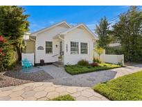 Charming single-story home with a well-manicured front yard and inviting curb appeal at 1617 Oak Ne St, St Petersburg, FL 33704