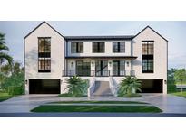 Stunning, modern home featuring a white brick facade, black trim, and a grand staircase leading to a covered porch at 660 Geneva Pl, Tampa, FL 33606