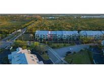 A beautiful condo complex with lush landscaping and stunning mangrove views at 3210 Mangrove Point Dr, Ruskin, FL 33570