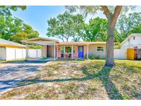 This well-maintained home boasts a cozy exterior and mature trees at 700 16Th Nw St, Largo, FL 33770