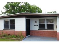 Close up of the front of the house showing the brick accents and the house number at 2936 39Th N Ave, St Petersburg, FL 33714