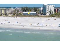 Exterior view of building with beach and ocean views at 200 120Th W Ave # 3A, Treasure Island, FL 33706
