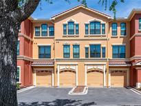 Beautiful townhome with a two-car garage, and neutral paint gives a feeling of being home at 2709 Via Cipriani # 522B, Clearwater, FL 33764